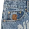 Faded arch logo denim pants